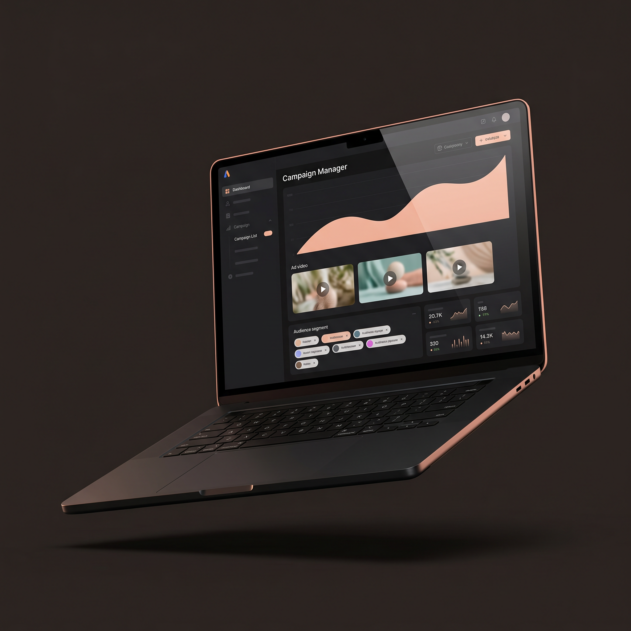 Laptop displaying an analytics dashboard with peach chart line, video thumbnails, and audience pills